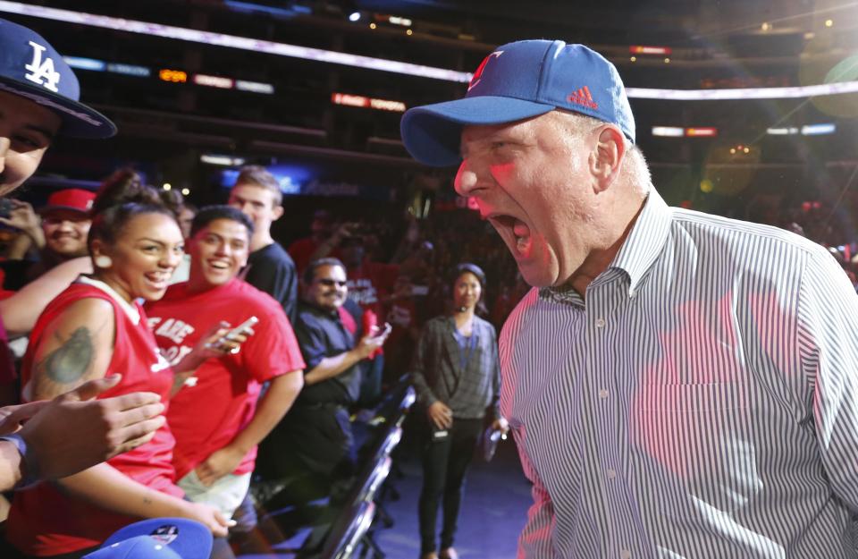 Los Angeles Clippers' new owner Steve Ballmer is introduced at a fan event at the Staples Center in Los Angeles, California in this August 18, 2014 file photo. REUTERS/Lucy Nicholson/Files (UNITED STATES - Tags: BUSINESS SPORT BASKETBALL TPX IMAGES OF THE DAY)