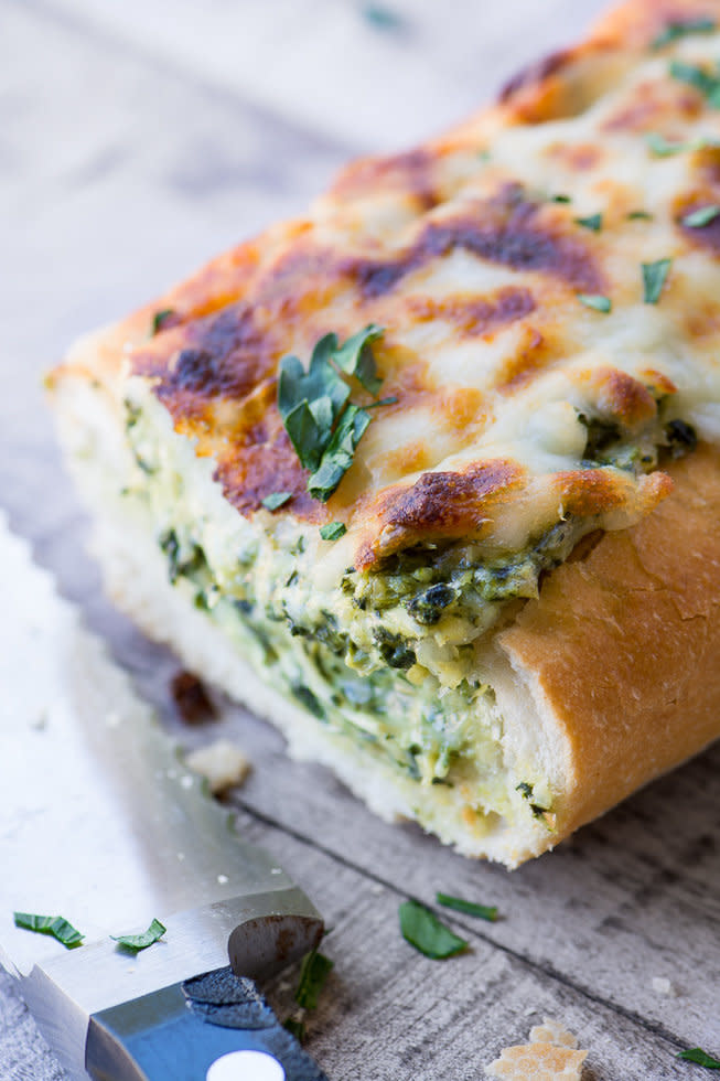 <strong>Get the <a href="https://theviewfromgreatisland.com/cheesy-spinach-artichoke-bread-recipe/" target="_blank">Cheesy Spinach Artichoke Bread recipe</a>&nbsp;from&nbsp;The View from Great Island</strong>