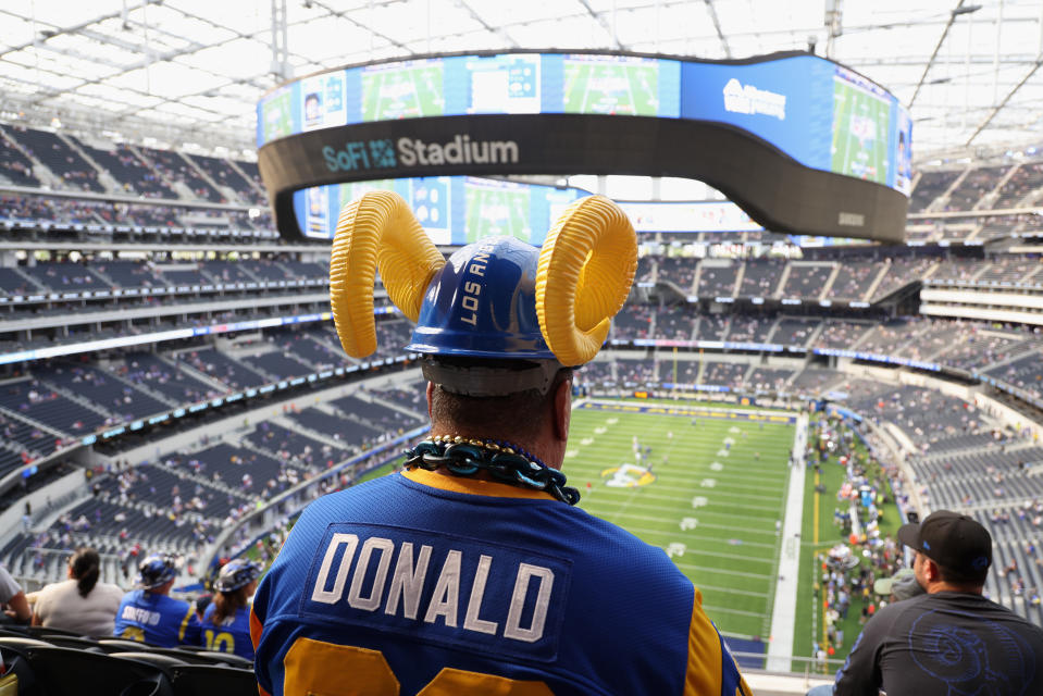 INGLEWOOD, CALIFORNIA – SEPTEMBER 08: A fan of the Los Angeles Rams watches warm ups to the NFL game against the Buffalo Bills at SoFi Stadium on September 08, 2022 in Inglewood, California. (Photo by Harry How/Getty Images)