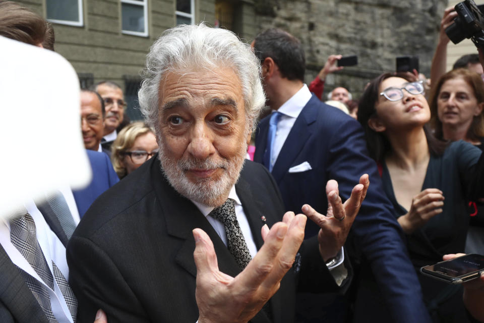 Placido Domingo talks to fans at the 'Festspielhaus' opera house after he performed 'Luisa Miller' by Giuseppe Verdi in Salzburg, Austria, Sunday, Aug. 25, 2019. Domingo is scheduled to appear onstage at the Salzburg Festival to perform for the first time since multiple women have accused the opera legend of sexual harassment in allegations brought to light by The Associated Press. (AP Photo/Matthias Schrader)