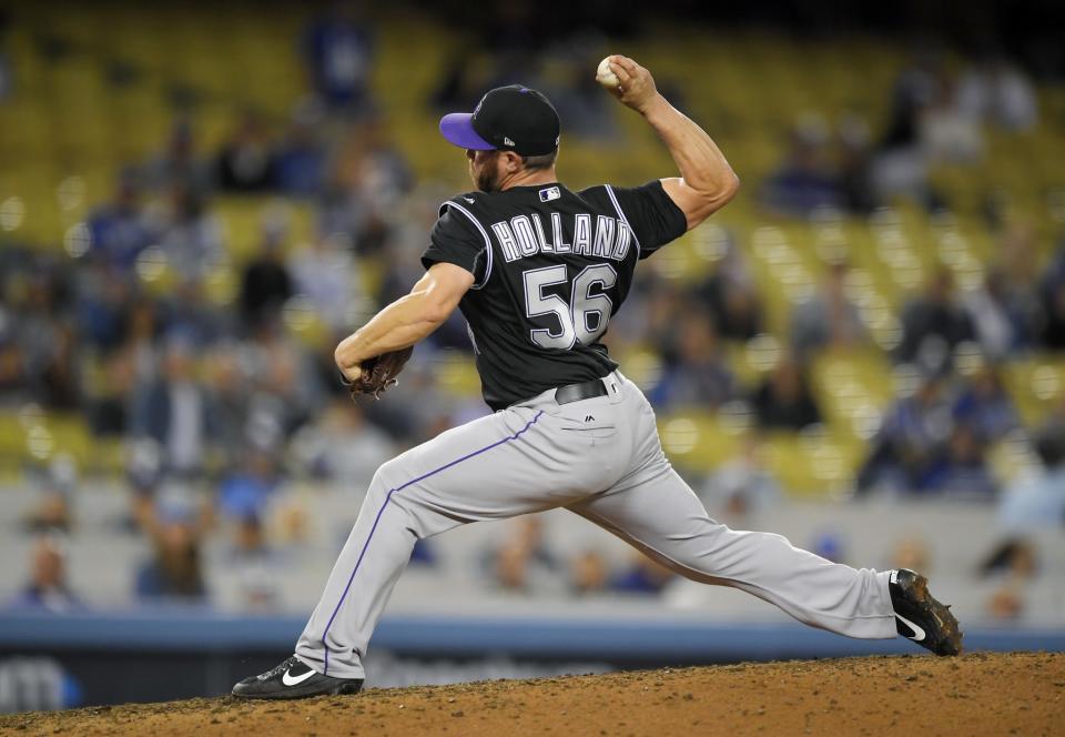 Greg Holland is using his slider more often this season as he transitions from playing in the American League to the National League. AP Photo/Mark J. Terrill)