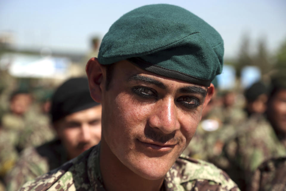 Afghan National Army attends their graduation ceremony from a 3-month training program at the Afghan Military Academy in Kabul, Afghanistan, Monday, May 27, 2019. (AP Photo/Rahmat Gul)