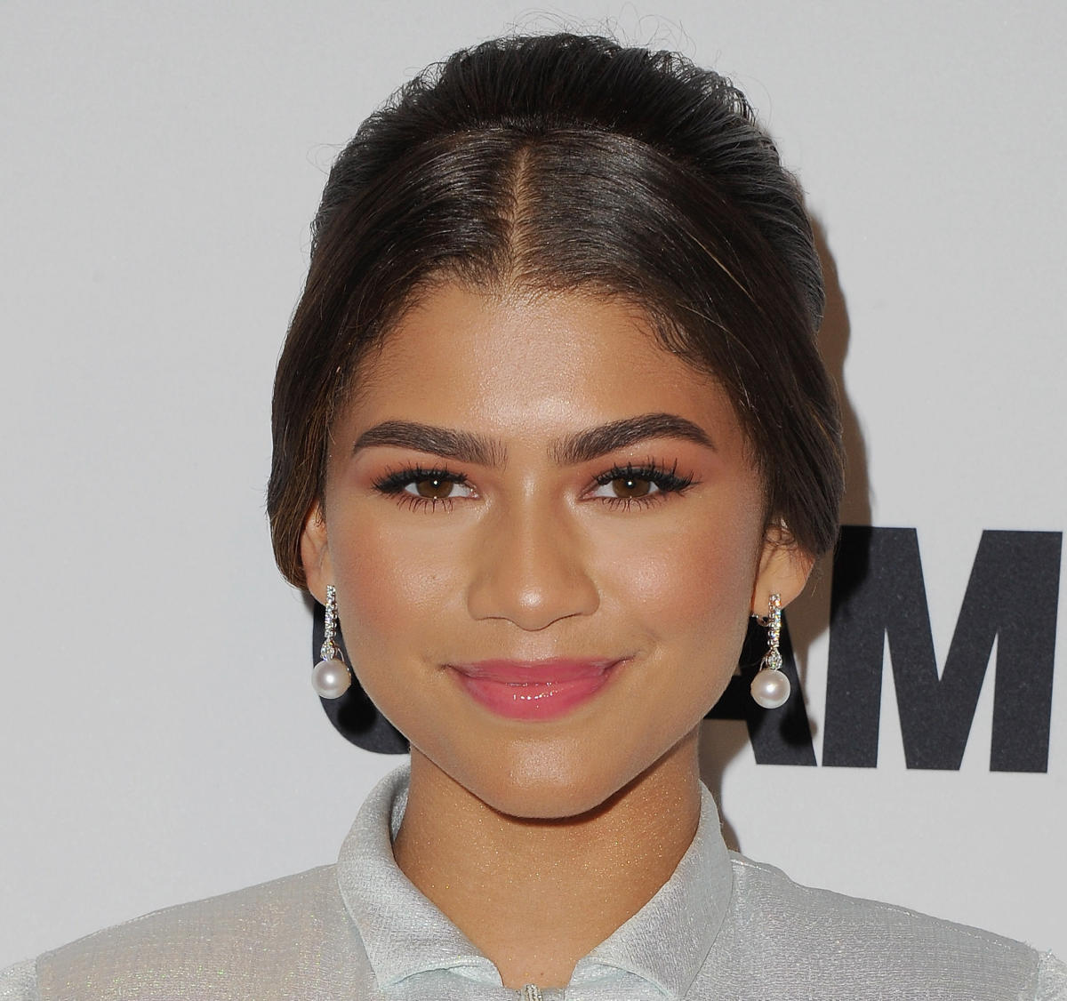 Zendaya looks more stylish at a basketball game than we've ever looked in  our entire lives