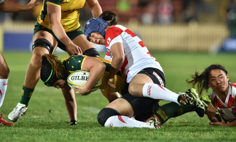 Down but not out - Australia's Emily Chancellor (L), in action against Japan in 2019, has high hopes for women's rugby