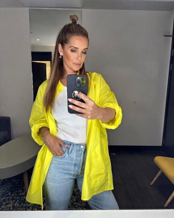 Louise Redknapp wears a yellow shirt and denim jeans