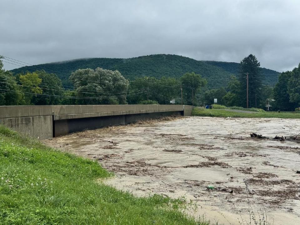 The Canisteo River slams against a bridge in Steuben County, New York after the remnants of Debby moved through the Northeast on Friday, Aug. 9, 2024.