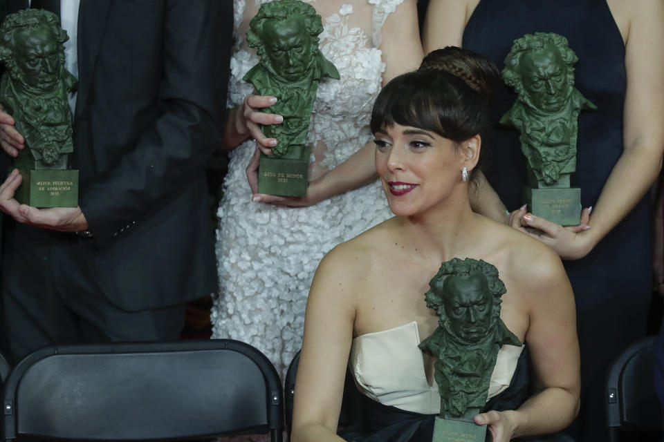 Belen Cuesta holds her trophy after wining the best leading actress award for "La trinchera infinita" during the Goya Film Awards Ceremony in Malaga, southern Spain, early Sunday, Jan. 26, 2020. The annual Goya Awards are Spain's main national film awards. (AP Photo/Manu Fernandez)
