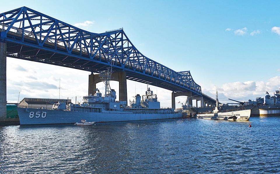 The destroyer Joseph P. Kennedy Jr. sits in Battleship Cove alongside the submarine Lionfish and Battleship Massachusetts on Tuesday, Nov. 14. The Kennedy and Lionfish are undergoing repairs and preservation work.