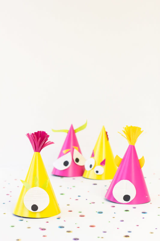 <p>Studio DIY</p><p>Longing for a pop of bright color amongst the orange and black? Follow <a href="https://studiodiy.com/diy-monster-party-hats//" rel="nofollow noopener" target="_blank" data-ylk="slk:Studio DIY;elm:context_link;itc:0;sec:content-canvas" class="link ">Studio DIY</a>’s tutorial on how to make neon monster party hats for all the little boys and ghouls. </p>