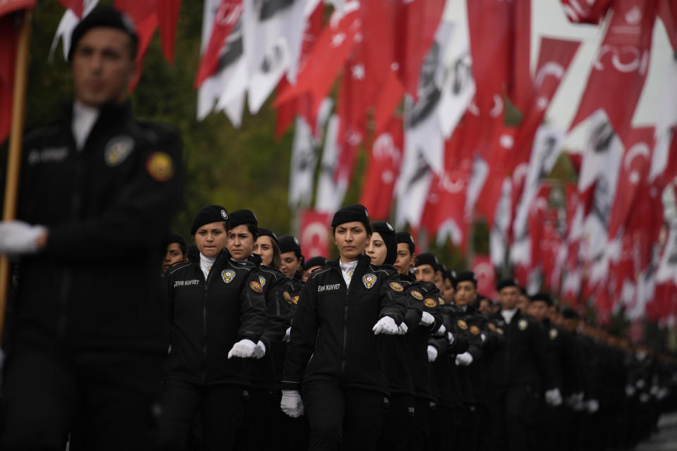 Turkey's policepersons in a parade as part of celebrations marking the 100th anniversary of the creation of the modern, secular Turkish Republic, in Istanbul, Turkey, Sunday, Oct. 29, 2023. (AP Photo/Emrah Gurel)