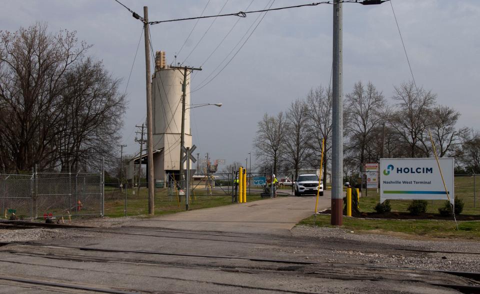 A Nashville police vehicle leaves Holcim property in Nashville, Tenn., Friday, March 22, 2024. The body of Riley Strain, missing University of Missouri student, was discovered Friday morning in the Cumberland River, reportedly near Holcim property.