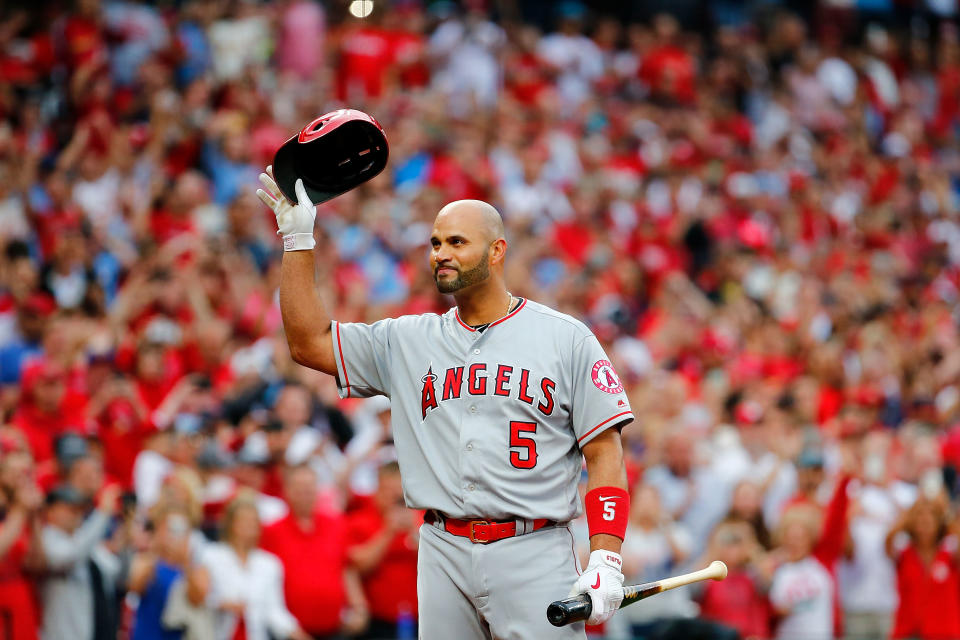 Albert Pujols was greeted with a one-minute standing ovation in his emotional return to St. Louis. (Photo by Dilip Vishwanat/Getty Images)