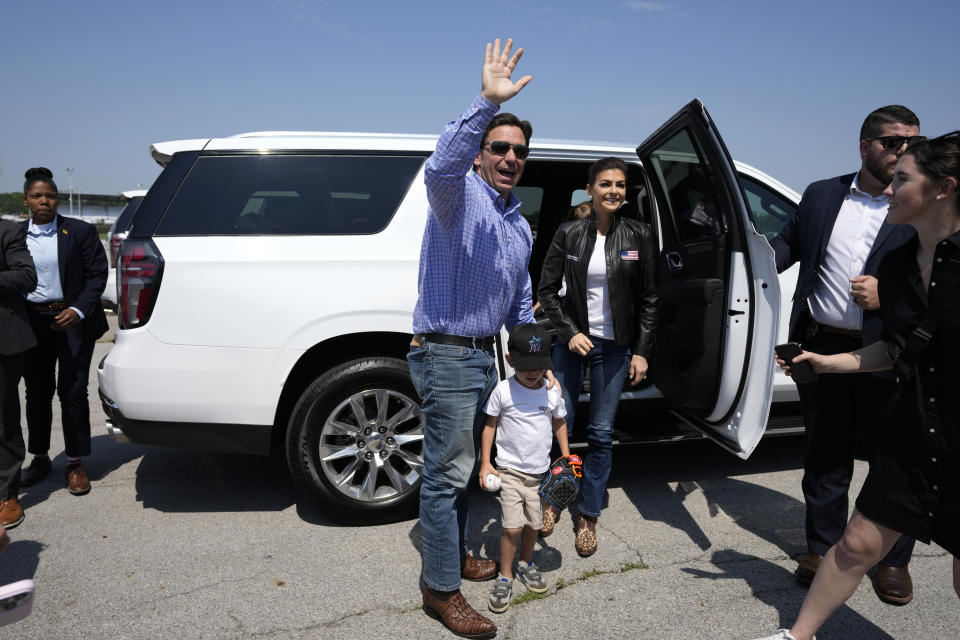 Republican presidential candidate Florida Gov. Ron DeSantis and his wife Casey arrive at U.S. Sen. Joni Ernst's Roast and Ride, Saturday, June 3, 2023, in Des Moines, Iowa. (AP Photo/Charlie Neibergall)