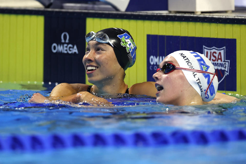 OMAHA, NEBRASKA - JUNE 13: Torri Huske of the United States reacts after setting an American record with Claire Curzan while competing in a semifinal heat for the Women's 100m butterfly during Day One of the 2021 U.S. Olympic Team Swimming Trials at CHI Health Center on June 13, 2021 in Omaha, Nebraska. (Photo by Al Bello/Getty Images)