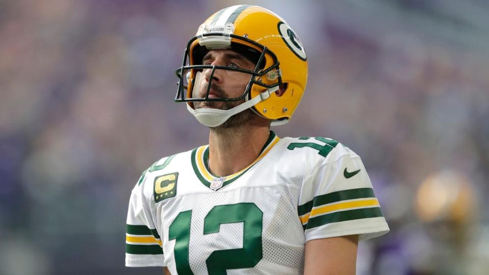 Green Bay Packers quarterback Aaron Rodgers (12) reacts after wide receiver Christian Watson (9) dropped a wide open long pass against the Minnesota Vikings on the first play from scrimmage during their football game Sunday, September 11, 2022, at U.S. Bank Stadium in Minneapolis, Min.