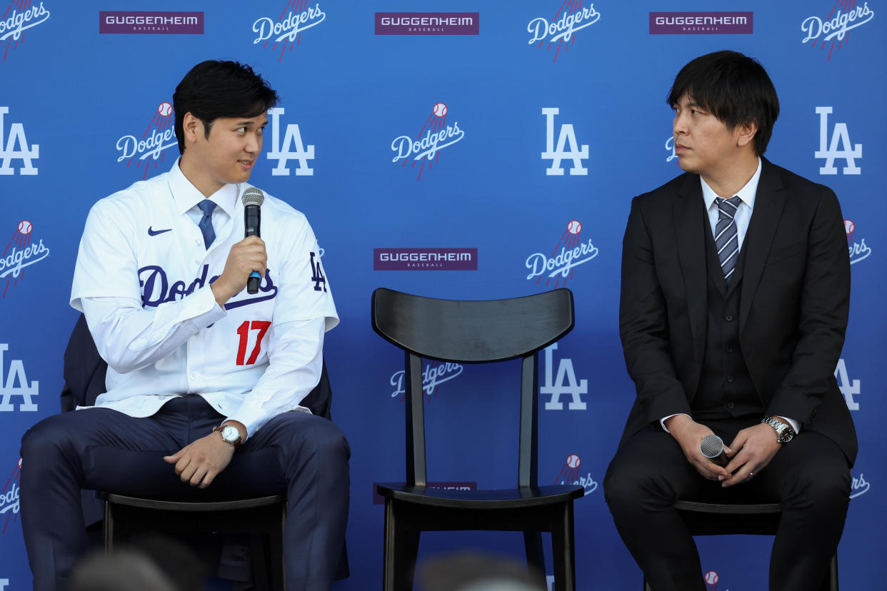 LOS ANGELES, CA - DECEMBER 14: Shohei Ohtani answers questions and Ippei Mizuhara translates during the Shohei Ohtani Los Angeles Dodgers Press Conference at Dodger Stadium on Thursday, December 14, 2023 in Los Angeles, California. (Photo by Rob Leiter/MLB Photos via Getty Images)