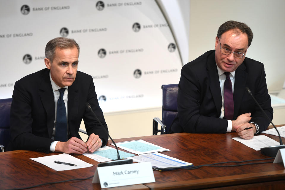 Out-going Governor of the Bank of England (BOE) Mark Carney (L) and incoming Governor Andrew Bailey (R) atttend a news conference at Bank Of England in London on March 11, 2020, after the central bank announced a cut in interest rates. - The Bank of England on March 11 slashed its main interest rate to 0.25 percent in an emergency move to combat the economic fallout from the coronavirus outbreak on the UK economy. (Photo by Peter Summers / POOL / AFP) (Photo by PETER SUMMERS/POOL/AFP via Getty Images)