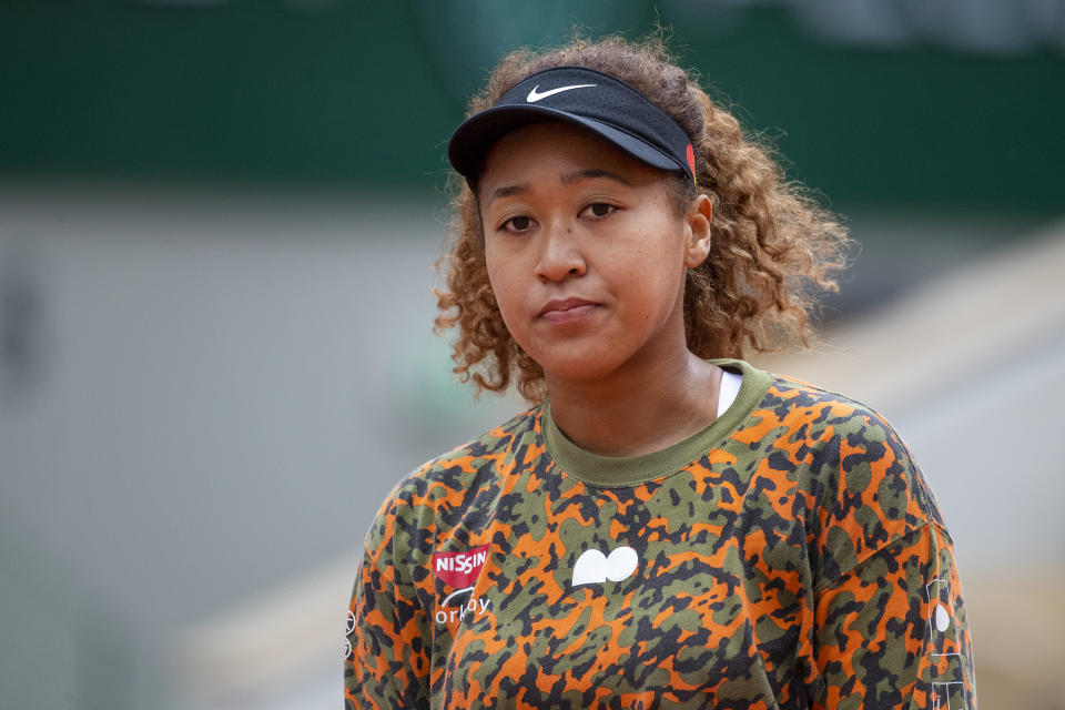 PARIS, FRANCE May 26. Naomi Osaka of Japan during practice on Court Philippe-Chatrier during a practice match against Ashleigh Barty of Australia  in preparation for the 2021 French Open Tennis Tournament at Roland Garros on May 2pm 6th 2021 in Paris, France. (Photo by Tim Clayton/Corbis via Getty Images)