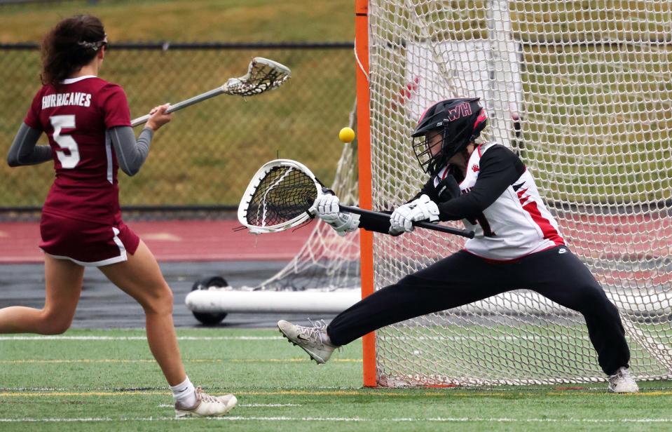 Whitman-Hanson's goalie Liv Godwin makes the save on Amherst Pelham's April Schilling during a game on Saturday, June 3, 2023.