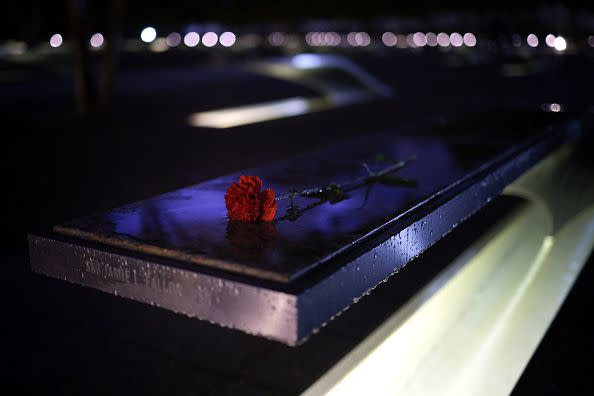 ARLINGTON, VIRGINIA - SEPTEMBER 11: A rose is placed on a bench at the National 9/11 Pentagon Memorial during a ceremony observing the 9/11 terrorist attacks at the Pentagon on September 11, 2023 in Arlington, Virginia. The Defense Department held a remembrance ceremony for the 184 lives lost in the 2001 terrorist attack on the Pentagon. Today marks the 22nd anniversary of September 11, 2001 terrorist attacks at the World Trade Center, the Pentagon and Shanksville, Pennsylvania. (Photo by Win McNamee/Getty Images)