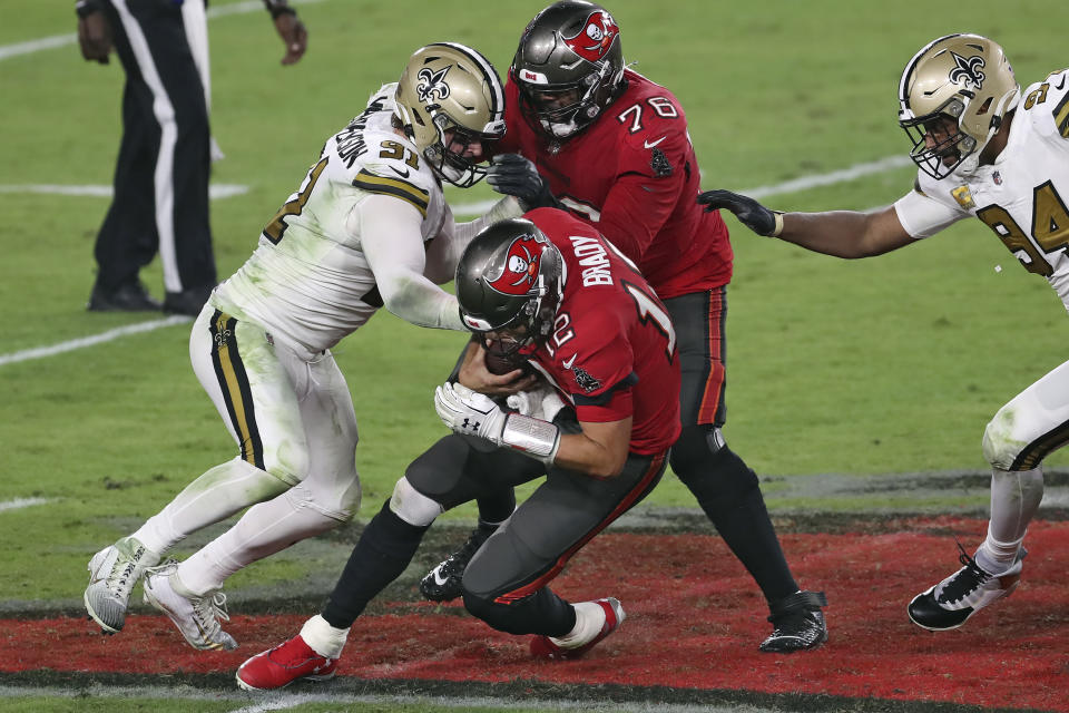 New Orleans Saints defensive end Trey Hendrickson (91) sacks Tampa Bay Buccaneers quarterback Tom Brady (12) during the second half of an NFL football game Sunday, Nov. 8, 2020, in Tampa, Fla. (AP Photo/Mark LoMoglio)