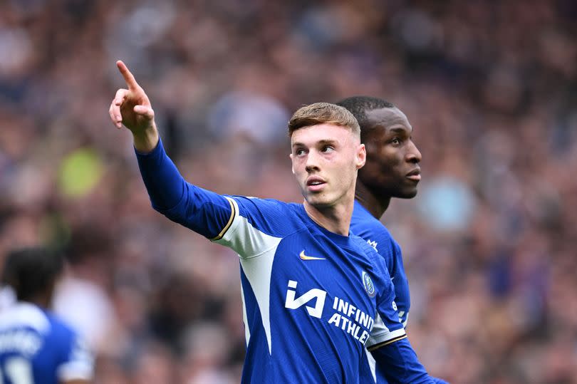 Cole Palmer celebrates scoring a goal for Chelsea