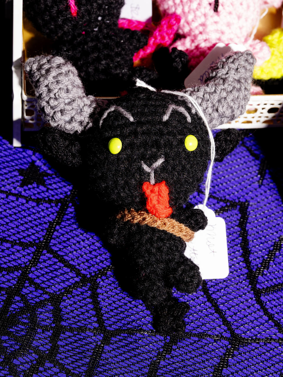 A knitted Krampus made by Knot Knitted at "A Christmas to Dismember." 