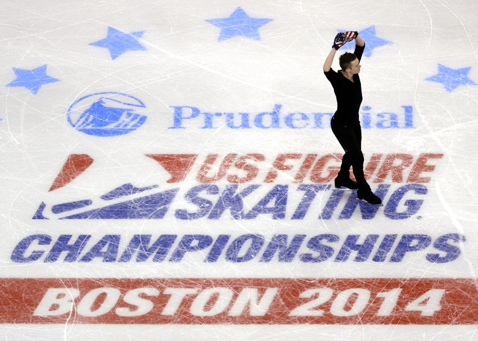 Jeremy Abbott skates during the men's practice session at the U.S. Figure Skating Championships in Boston, Wednesday, Jan. 8, 2014. (AP Photo/Elise Amendola)
