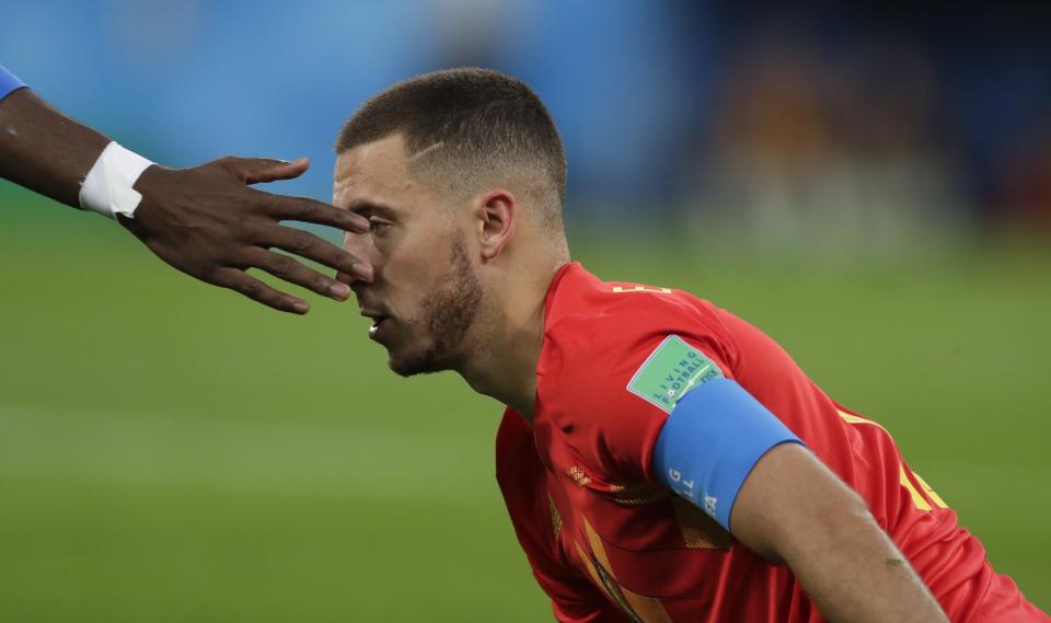 <p>Belgium’s Eden Hazard is helped stand up by France’s Paul Pogba during the semifinal match between France and Belgium at the 2018 soccer World Cup in the St. Petersburg Stadium, in St. Petersburg, Russia, Tuesday, July 10, 2018. (AP Photo/Petr David Josek) </p>