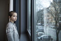 David, a boy from an orphanage in Odesa, Ukraine, looks out the window after he arrives at a hotel in Berlin, Friday, March 4, 2022. More than 100 Jewish refugee children who were evacuated from a foster care home in war-torn Ukraine and made their way across Europe by bus have arrived in Berlin. (AP Photo/Steffi Loos)