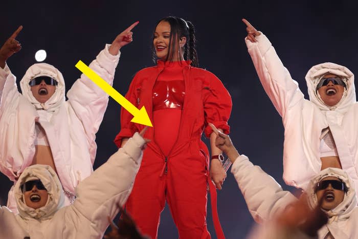 Arrow pointing to Rihanna's stomach