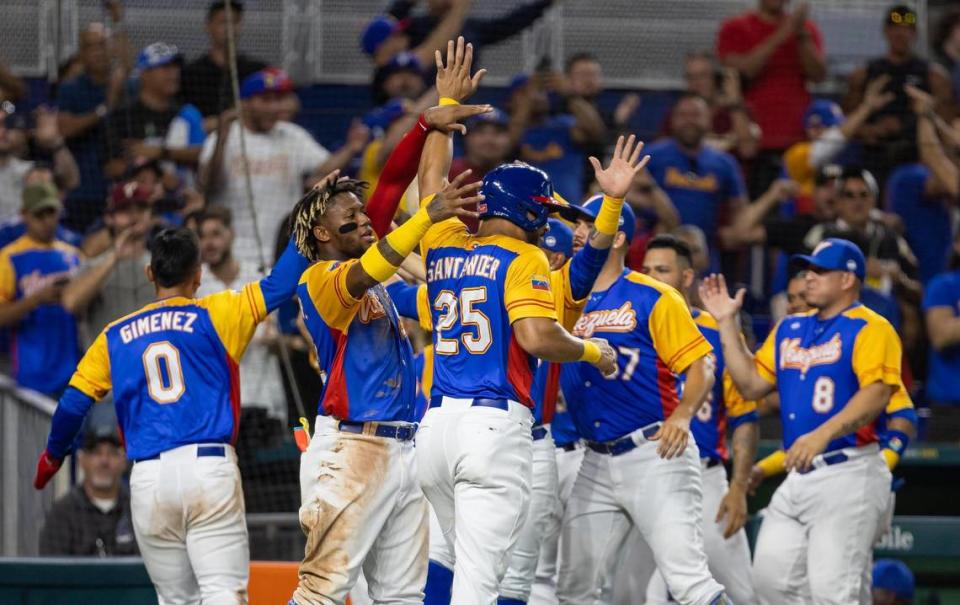 Venezuela outfielder Anthony Santander (25) celebrates after scoring a run against Nicaragua during the fourth inning of a Pool D game at the World Baseball Classic at loanDepot Park on Tuesday, March 14, 2023, in Miami, Fla.