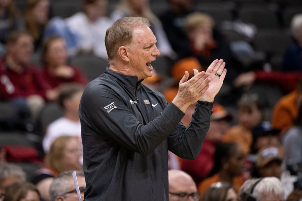 Kansas State women's basketball coach Jeff Mittie encourages his team during the Wildcats' Big 12 Tournament quarterfinal game against West Virginia on March 9 at T-Mobile Center in Kansas City, Mo.