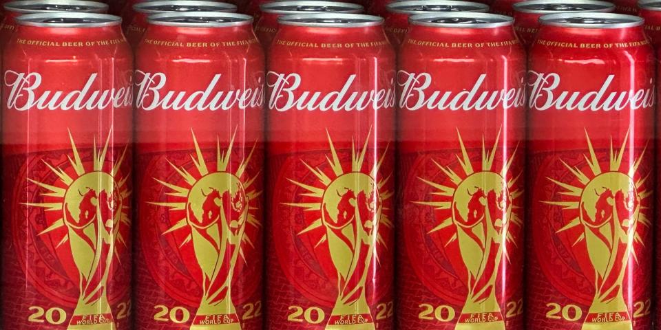 Cans of Budweiser beer featuring the FIFA World Cup logo are displayed in Doha on November 18, 2022 ahead of the Qatar 2022 World Cup football tournament.