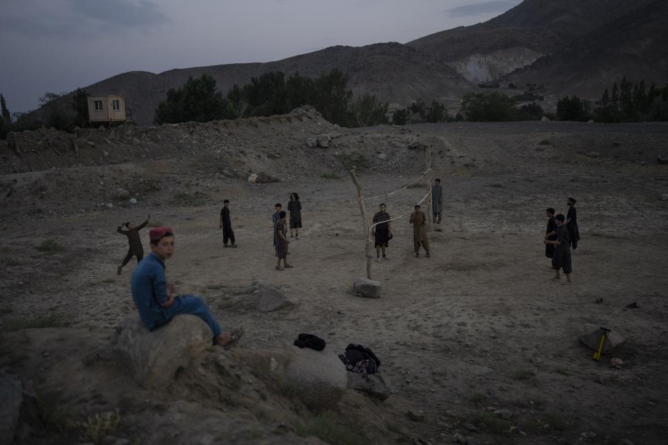 Men play volleyball in Wardak province, Afghanistan, Sunday, June 18, 2023. (AP Photo/Rodrigo Abd)