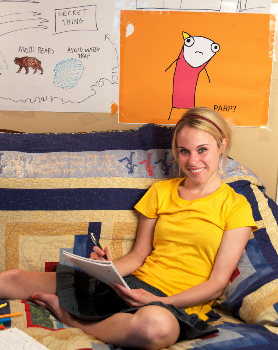  <em>Hyperbole and a Half</em> is Allie Brosh's first book. In it, as on her blog, she draws herself with a tube body and a yellow, triangle ponytail.<span class="copyright">Photo by Sarah Henderson</span>