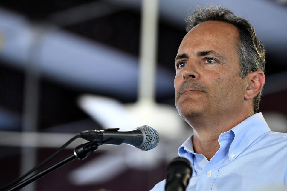 FILE - In this Aug. 3, 2019 file photo, Kentucky republican candidate for Governor, Gov. Matt Bevin, addresses the audience gathered at the Fancy Farm Picnic in Fancy Farm, Ky. Bevin touted the reliability of fossil fuels and called teen climate activist Greta Thunberg "remarkably ill-informed" during a conference on energy, a day after the teen gave an impassioned speech at the United Nations. (AP Photo/Timothy D. Easley, File)