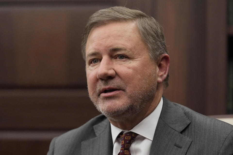 FILE - Oklahoma Attorney General Gentner Drummond speaks during an interview, Feb. 1, 2023, in Oklahoma City. Oklahoma is preparing to execute Jemaine Cannon on Thursday, July 20, 2023, for stabbing 20-year-old Sharonda Clark to death with a butcher knife in 1995 after his escape from a prison work center. In a statement sent to The Associated Press this week, Cannon's attorney, Mark Henricksen, said the state's decision to proceed with Cannon's execution amounts to “historic barbarism.” But prosecutors from the attorney general's office and Clark's adult daughters have urged the state to execute Cannon. (AP Photo/Sue Ogrocki, File)