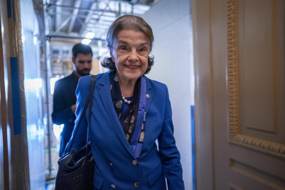 Sen. Dianne Feinstein, D-Calif., walks through a Senate corridor after telling her Democratic colleagues that she will not seek reelection in 2024, at the Capitol in Washington, Tuesday, Feb. 14, 2023. (AP Photo/J. Scott Applewhite)