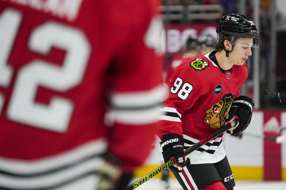 Chicago Blackhawks center Connor Bedard warms up for the team's preseason NHL hockey game against the St. Louis Blues on Thursday, Sept. 28, 2023, in Chicago. (AP Photo/Erin Hooley)
