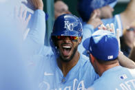 Kansas City Royals' MJ Melendez celebrates in the dugout after hitting a two-run home run during the seventh inning of a baseball game against the Chicago White Sox in Kansas City, Mo., Sunday, April 7, 2024. (AP Photo/Colin E. Braley)