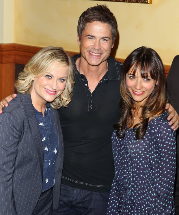 STUDIO CITY, CA - OCTOBER 16: Amy Poehler, Aubrey Plaza and Rob Lowe attend the NBC 'Parks And Recreation' 100th Episode Celebration held at CBS Studios - Radford on <a href="https://parade.com/living/october-holidays-observances/" rel="nofollow noopener" target="_blank" data-ylk="slk:October;elm:context_link;itc:0;sec:content-canvas" class="link ">October</a> 16, 2013 in Studio City, California. (Photo by JB Lacroix/WireImage)<p><a href="https://www.gettyimages.com/detail/184800649" rel="nofollow noopener" target="_blank" data-ylk="slk:JB Lacroix/Getty Images;elm:context_link;itc:0;sec:content-canvas" class="link ">JB Lacroix/Getty Images</a></p>