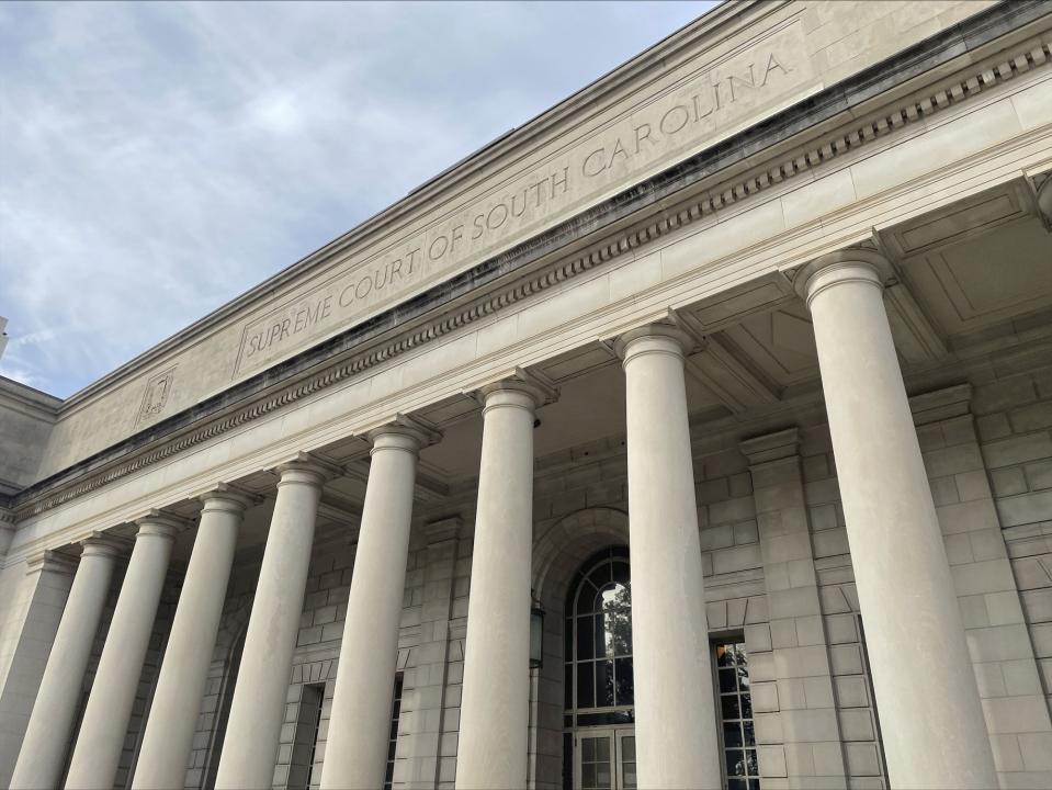 FILE - The exterior of the South Carolina Supreme Court building in Columbia, S.C. is shown Wednesday, Jan. 18, 2023. Justices threw out a deal, Wednesday, Sept. 6, 2023, cutting 16 years off the 35-year sentence of as man convicted of murder, saying a prosecutor and judge shouldn't have allowed the process to happen in secret. (AP Photo/James Pollard, File)