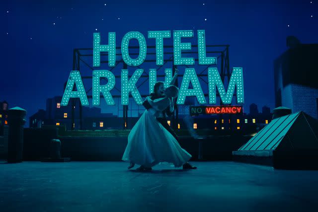 <p>Warner Bros.</p> Joaquin Phoenix and Lady Gaga dance in 'Joker: Folie à Deux'