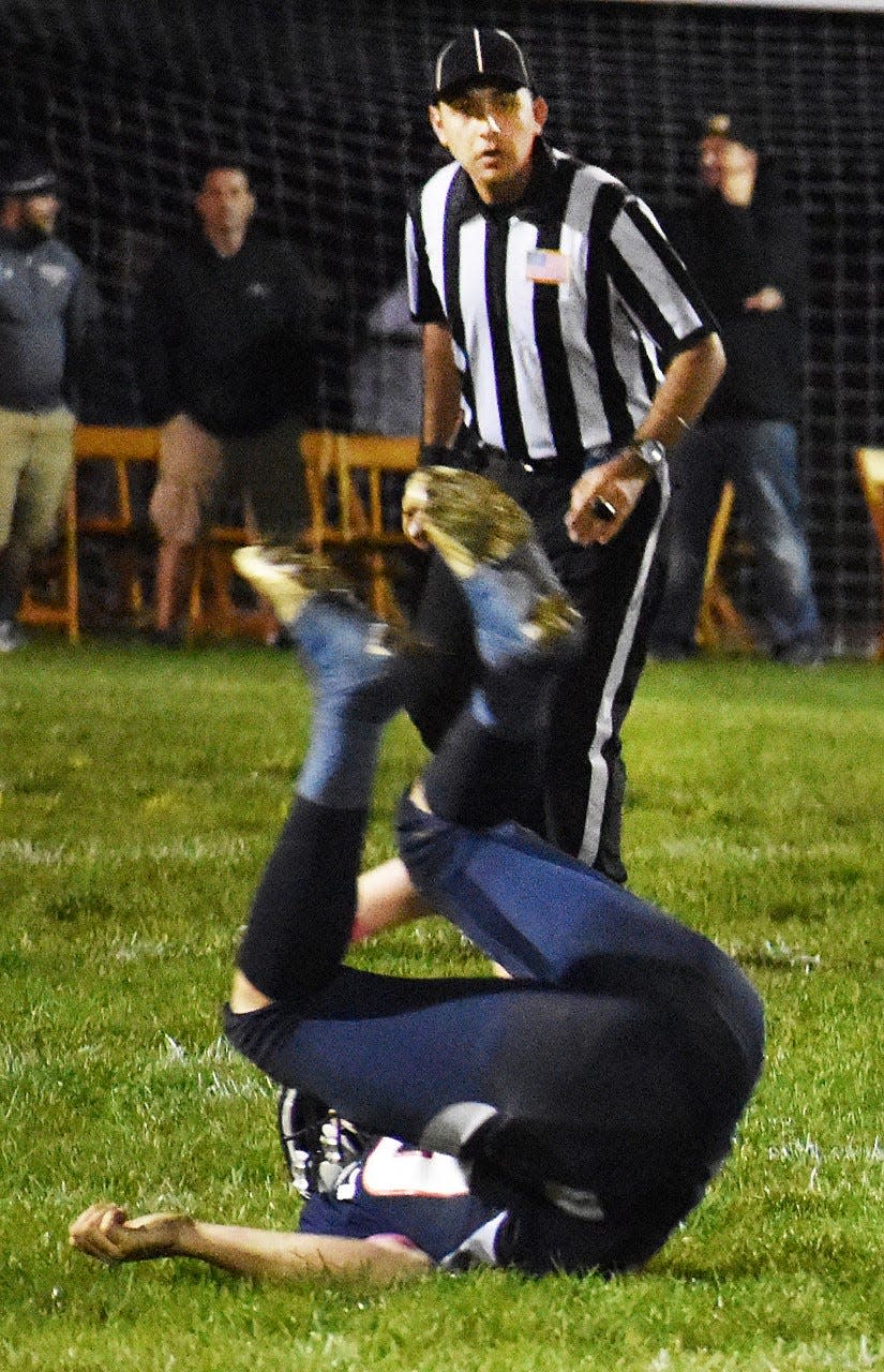Somerset resident Cameron Filipe watches as a player tumbles during a recent game at Apponequet Regional High School