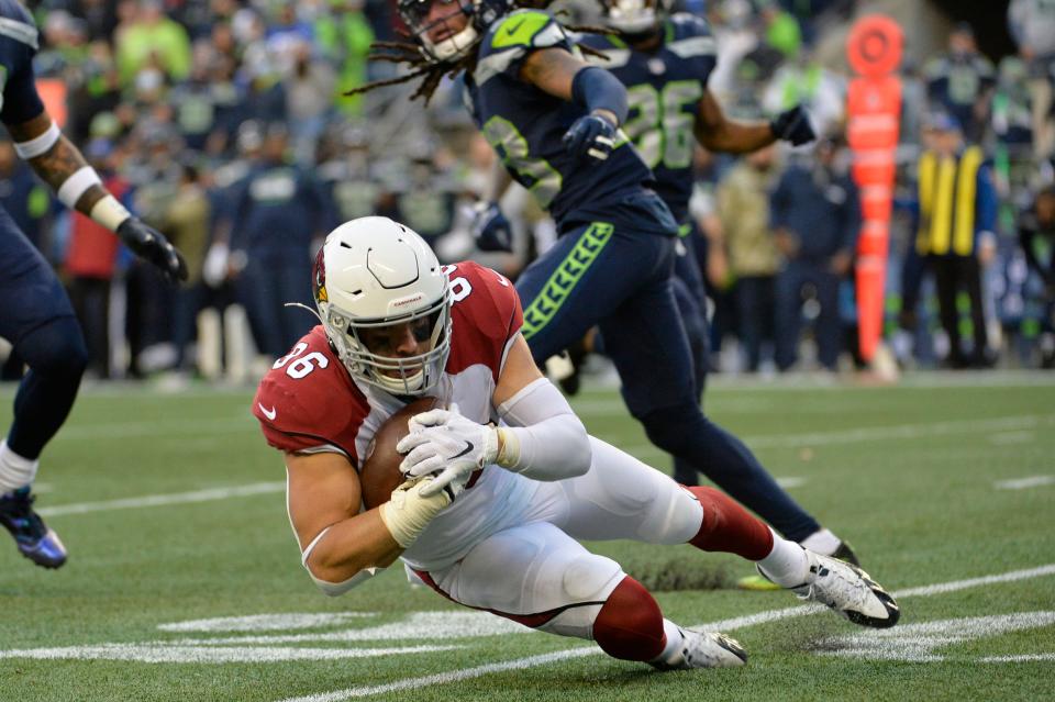 Nov 21, 2021; Seattle, Washington, USA; Arizona Cardinals tight end Zach Ertz (86) dives with the ball against the Seattle Seahawks during the second half at Lumen Field. Arizona defeated Seattle 23-13. Mandatory Credit: Steven Bisig-USA TODAY Sports