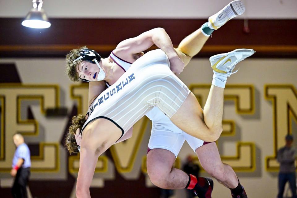 Mishawaka’s Christian Chavez takes down Penn’s Samuel Sullivan in the 195lb. match of the IHSAA Sectional Saturday, Jan. 29, 2022, at Mishawaka High School. Chavez won the match.