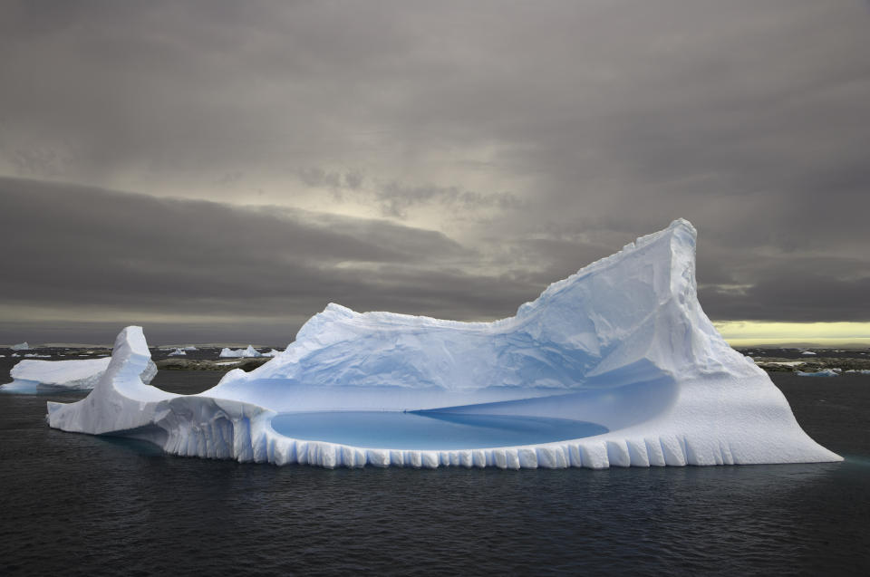 Icebergs stranded in shallow bay near Booth Island, Antarctica. (Photo: Eastcott Momatiuk/Getty Images)