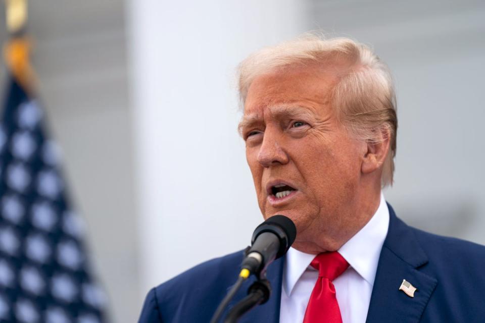 Donald Trump holds a news conference outside the Trump National Golf Club Bedminster on August 15, in Bedminster, New Jersey. He has championed removing taxes on tips (Getty Images)