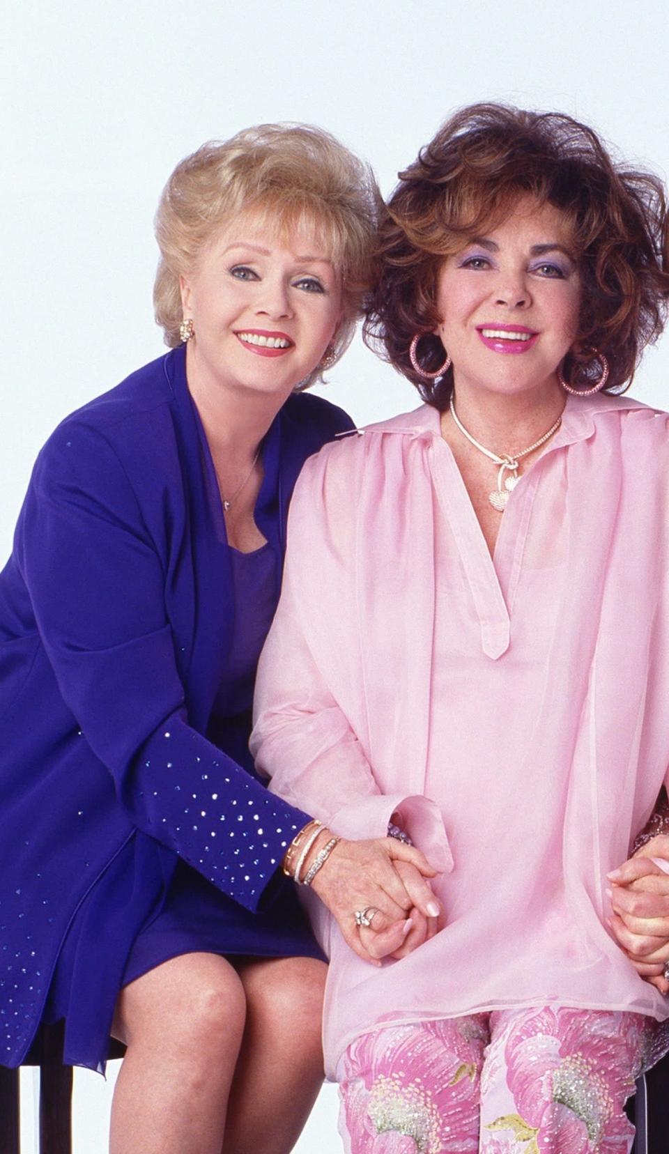 Debbie Reynolds and Elizabeth Taylor posing for promotional images for &#39;These Old Broads&#39;